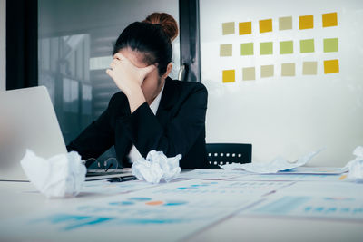 Woman working on table