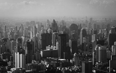 Aerial view of cityscape against sky