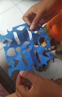 High angle view of people holding hands