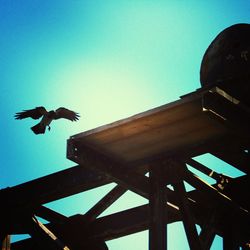 Low angle view of built structure against blue sky