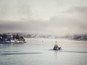 Boats sailing in river