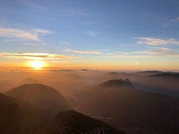 Scenic view of mountains against sky during sunset