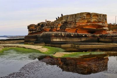 View of rock formation against sky