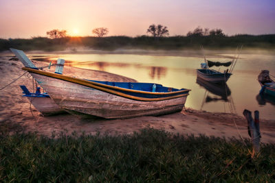 Boat stop on sea at sunset before night and peace time