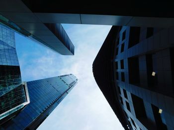 Low angle view of modern buildings against sky