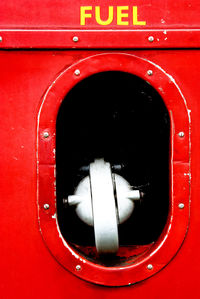 Close-up of red vintage car