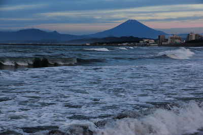 Scenic view of sea against sky during sunset