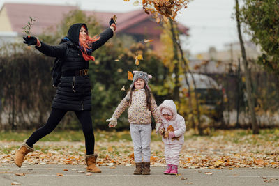 Full length of mother with daughter