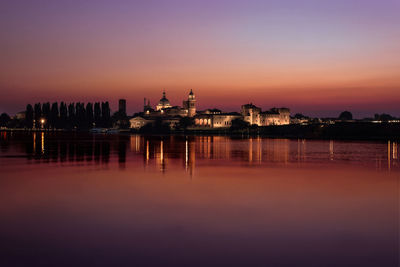 Silhouette of buildings at waterfront