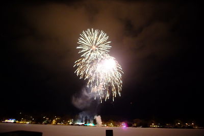 Firework display at night