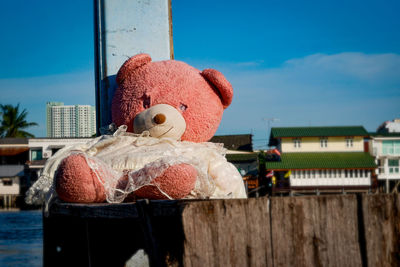 Stuffed toy against sky