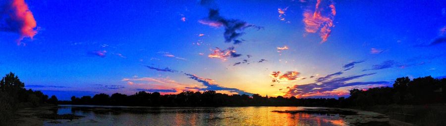 Scenic view of sea at sunset