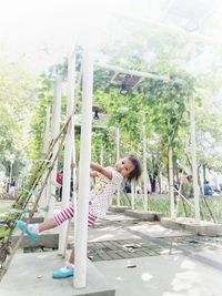 Portrait of young woman in park