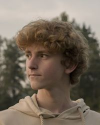 Close-up of young man looking away