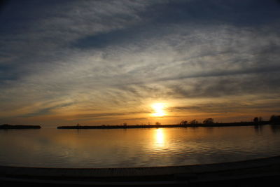 Scenic view of sunset over river