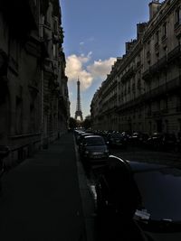 Cars parked on road in city