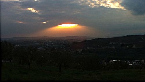 Scenic view of landscape at sunset