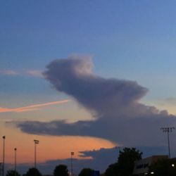 Scenic view of dramatic sky at sunset