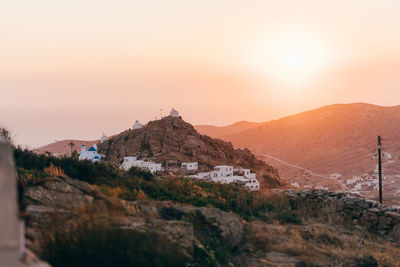 Scenic view of mountains against sky during sunset