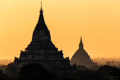 Cathedral against sky during sunset