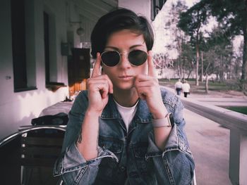 Portrait of young man wearing sunglasses