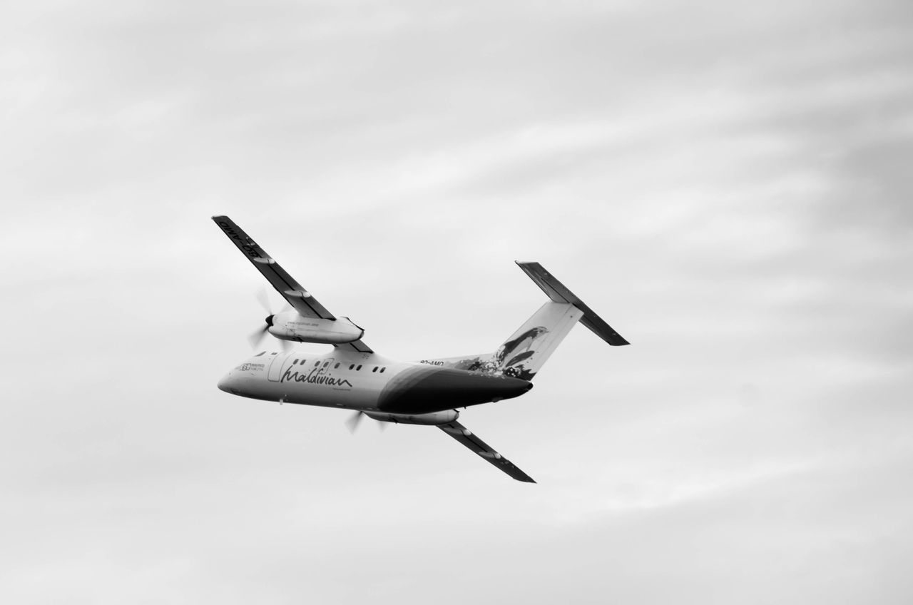 flying, airplane, air vehicle, mid-air, transportation, low angle view, mode of transport, sky, cloud - sky, on the move, travel, motion, journey, cloudy, public transportation, cloud, airshow, fighter plane, military airplane, commercial airplane