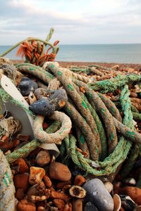 Environmental damage on beach plastic fishing waste . 