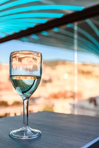 Close-up of wineglass on table