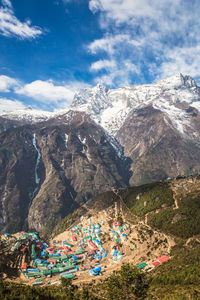 Scenic view of snowcapped mountains against sky