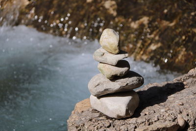 Close-up of stone stack on rock