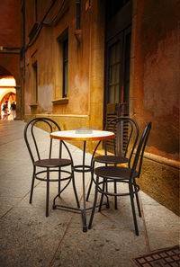 The table and chairs in the street outdoor cafe. selective focus