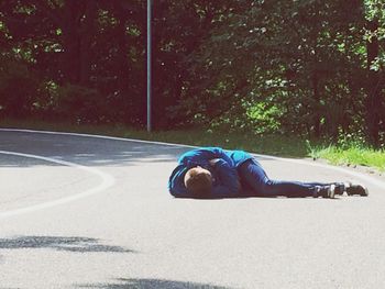 Young man on road