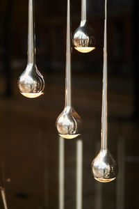 Close-up of light bulb hanging