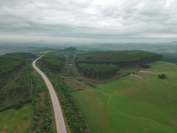 High angle view of road amidst landscape against sky