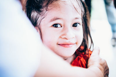 Portrait of cute girl smiling