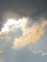 Low angle view of clouds in sky during sunset