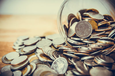 Close-up of coins on table