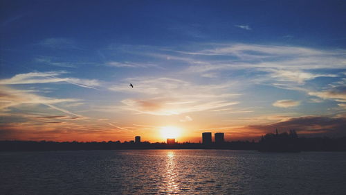 Scenic view of sea at sunset