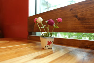 Flower vase on table