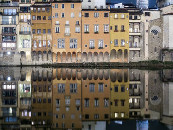 Reflection of buildings in river - florence