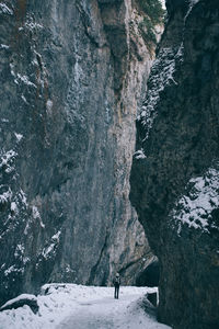 Footpath amidst rock cliffs