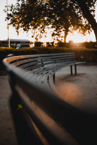 Close-up of empty bench on table at park