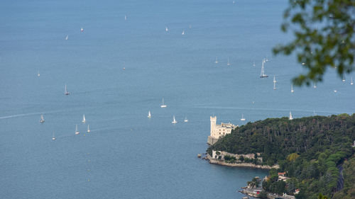 High angle view of river by city against sky