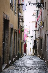 Street amidst houses in town