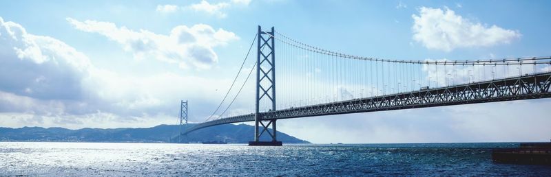 Low angle view of bridge over sea