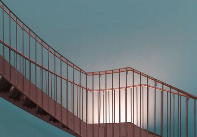 Low angle view of steps against clear blue sky