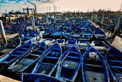 High angle view of fishing boats moored at harbor