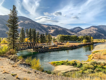 Scenic view of the chopaka bridge on the simikameen river in a mountain valley in british columbia