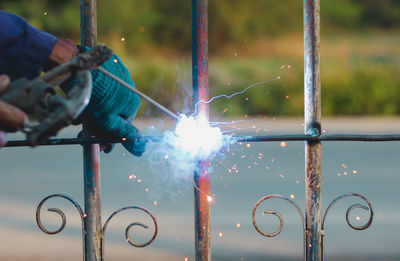 Man working on metal structure