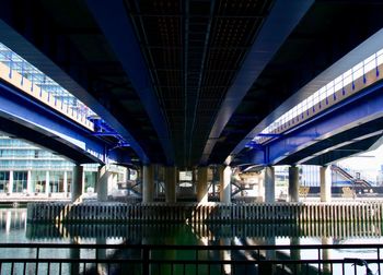 Illuminated bridge in city